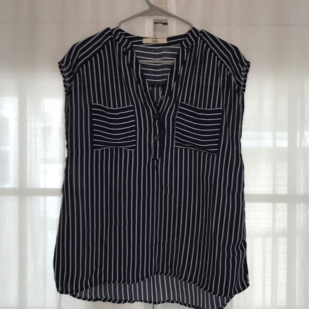 Slightly sheer navy and white sleeveless blouse